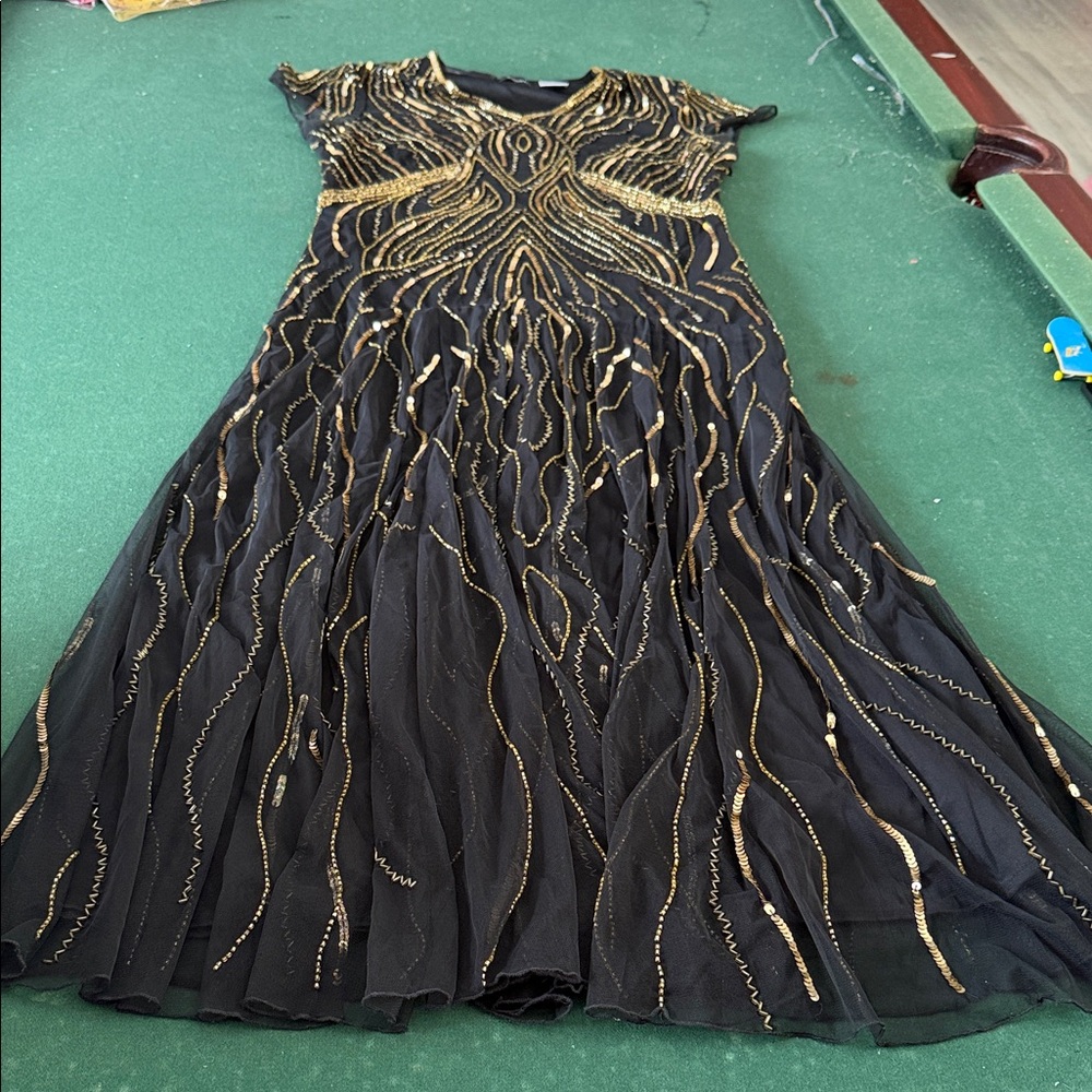 Ashro Black and Gold Maxi Dress. CAJA. # 1 A